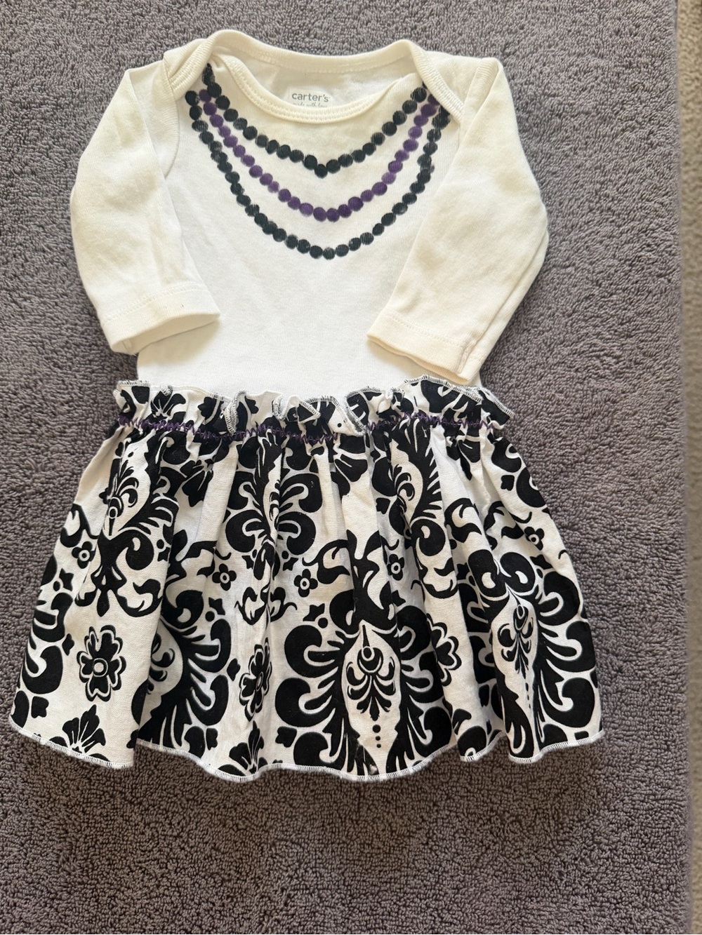 Carter's Cream Dress with Black & Purple Necklace Print